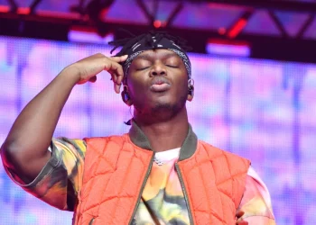 KSI has revealed that football sensation Wayne Rooney challenged him to a boxing match!